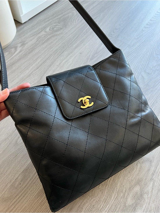 CHANEL Handbags - CHANEL Black Quilted Lambskin Shoulder Bag with Gold CC Hardware